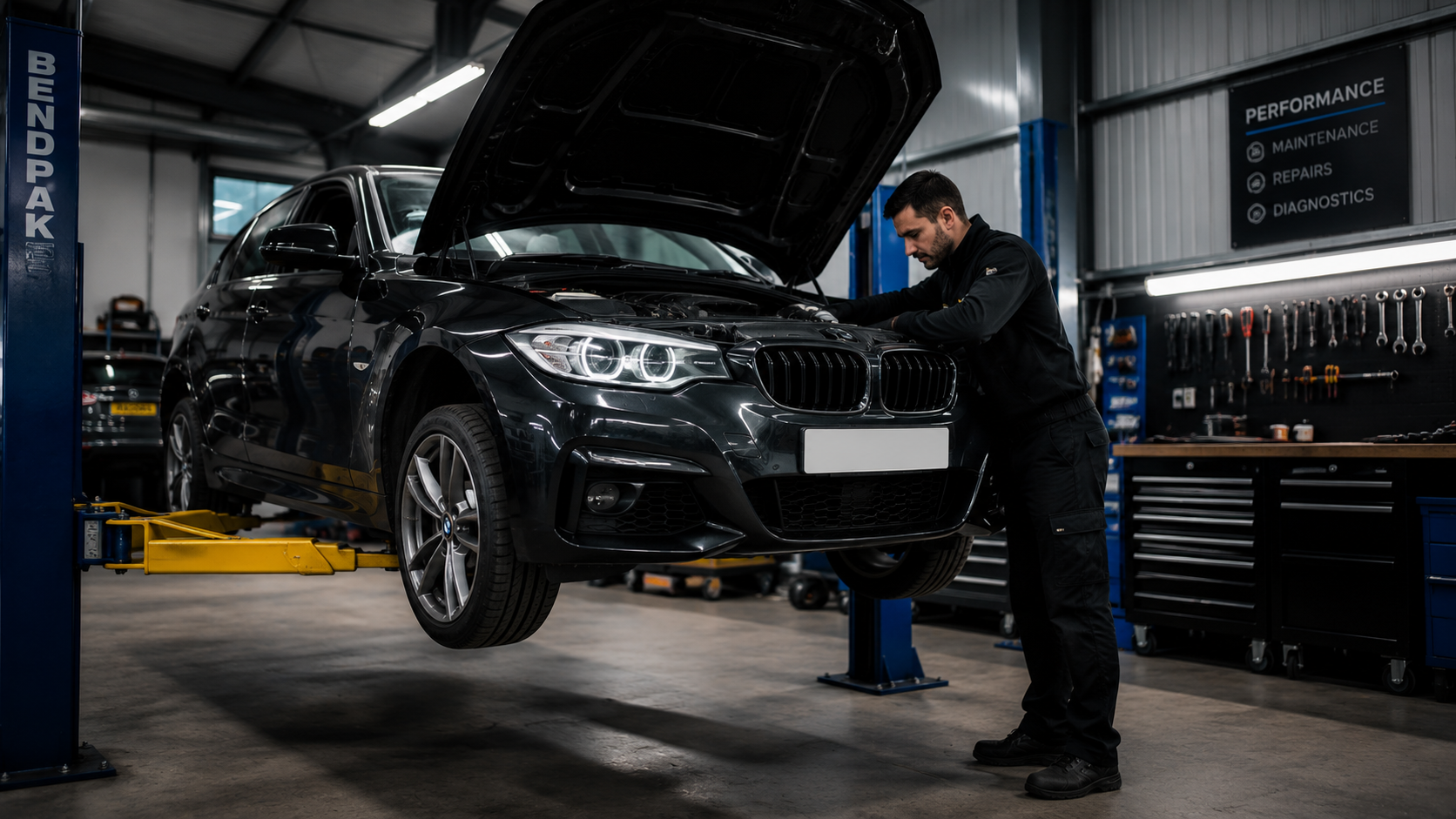Modern automotive workshop with a German car on a lift